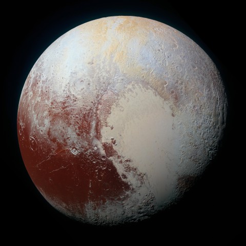 Planet Pluto: NASA's New Horizons spacecraft captured this high-resolution enhanced color view of Pluto on July 14, 2015. The image combines blue, red and infrared images taken by the Ralph/Multispectral Visual Imaging Camera (MVIC)